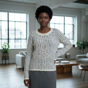 Woman wearing a patterned sweater in a modern living room